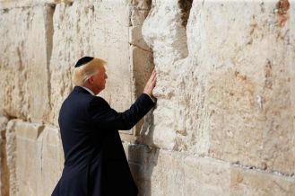 US-President-Donald-Trump-touches-the-Western-Wall-Judaisms-holiest-prayer-site-in-Jerusalems